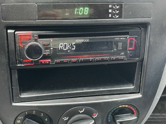 Красный Шевроле Лачетти, объемом двигателя 1.4 л и пробегом 241 тыс. км за 4200 $, фото 5 на Automoto.ua