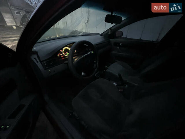 Красный Шевроле Лачетти, объемом двигателя 1.8 л и пробегом 305 тыс. км за 1850 $, фото 8 на Automoto.ua