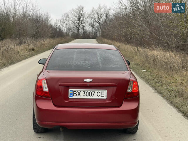 Красный Шевроле Лачетти, объемом двигателя 1.6 л и пробегом 223 тыс. км за 3700 $, фото 15 на Automoto.ua