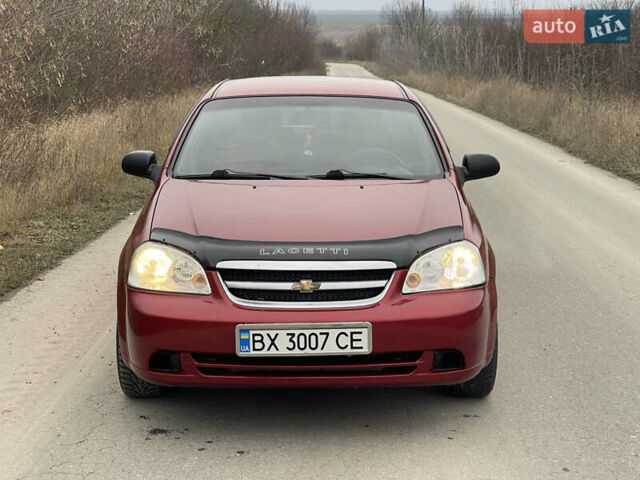 Красный Шевроле Лачетти, объемом двигателя 1.6 л и пробегом 223 тыс. км за 3700 $, фото 8 на Automoto.ua