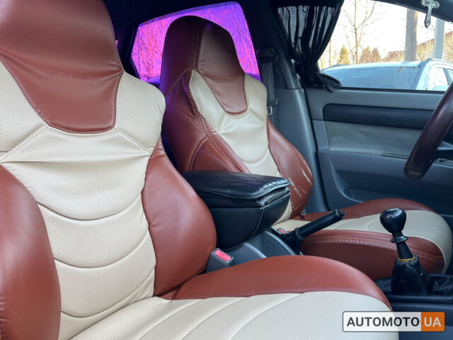 Красный Шевроле Лачетти, объемом двигателя 1.6 л и пробегом 256 тыс. км за 4300 $, фото 23 на Automoto.ua