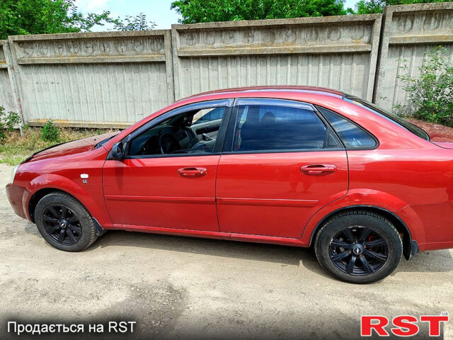 Червоний Шевроле Лачетті, об'ємом двигуна 1.6 л та пробігом 243 тис. км за 3899 $, фото 4 на Automoto.ua