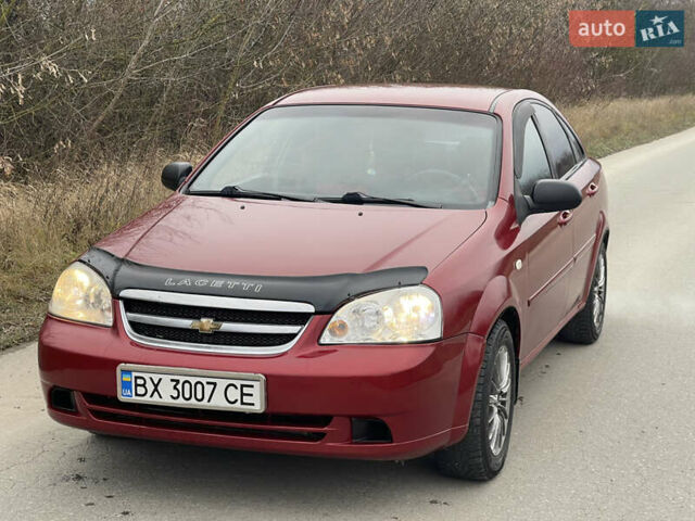 Красный Шевроле Лачетти, объемом двигателя 1.6 л и пробегом 223 тыс. км за 3700 $, фото 6 на Automoto.ua