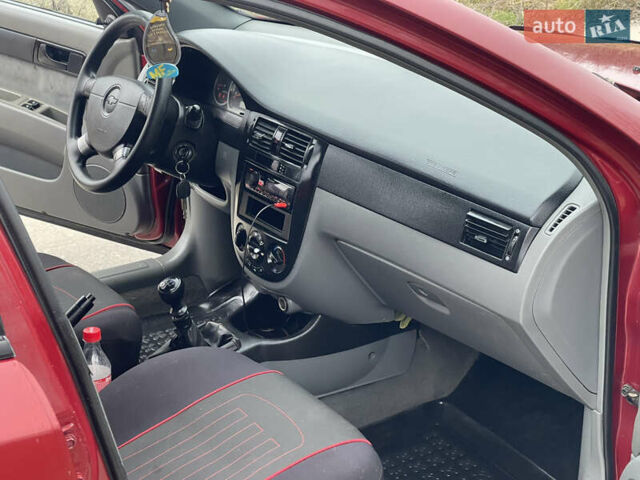 Красный Шевроле Лачетти, объемом двигателя 1.6 л и пробегом 223 тыс. км за 3700 $, фото 26 на Automoto.ua