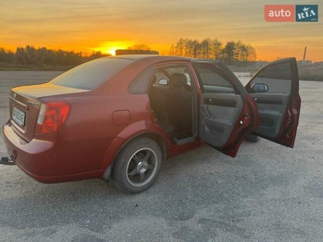 Красный Шевроле Лачетти, объемом двигателя 1.8 л и пробегом 189 тыс. км за 4200 $, фото 7 на Automoto.ua