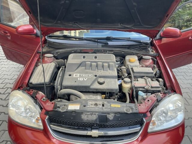 Красный Шевроле Лачетти, объемом двигателя 1.4 л и пробегом 241 тыс. км за 4200 $, фото 6 на Automoto.ua