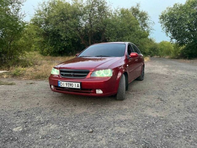 Красный Шевроле Лачетти, объемом двигателя 1.8 л и пробегом 211 тыс. км за 5200 $, фото 4 на Automoto.ua