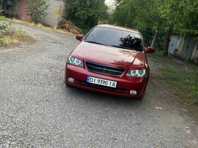 Красный Шевроле Лачетти, объемом двигателя 1.8 л и пробегом 211 тыс. км за 5200 $, фото 6 на Automoto.ua