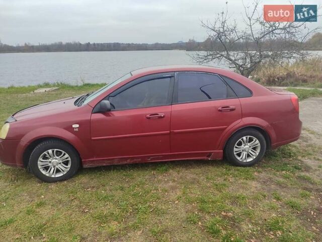 Красный Шевроле Лачетти, объемом двигателя 1.6 л и пробегом 296 тыс. км за 2900 $, фото 3 на Automoto.ua