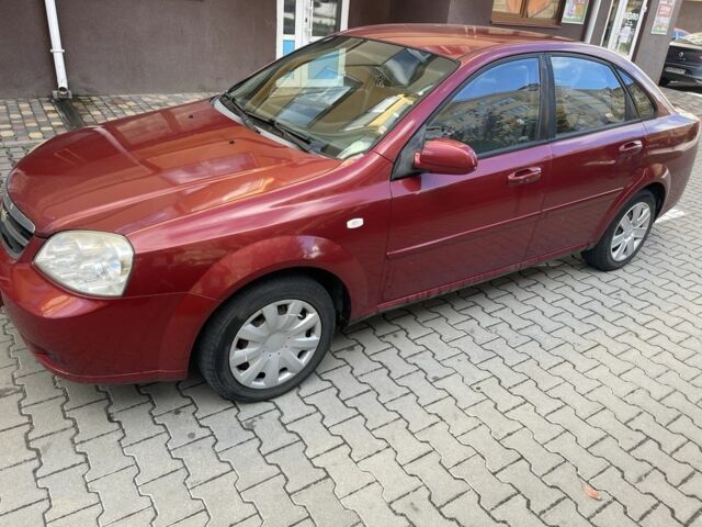 Красный Шевроле Лачетти, объемом двигателя 1.4 л и пробегом 241 тыс. км за 4200 $, фото 4 на Automoto.ua