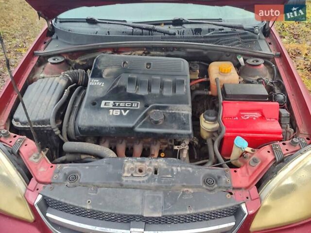 Красный Шевроле Лачетти, объемом двигателя 1.6 л и пробегом 296 тыс. км за 2900 $, фото 4 на Automoto.ua