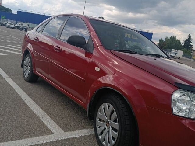 Червоний Шевроле Лачетті, об'ємом двигуна 1.6 л та пробігом 265 тис. км за 3099 $, фото 6 на Automoto.ua