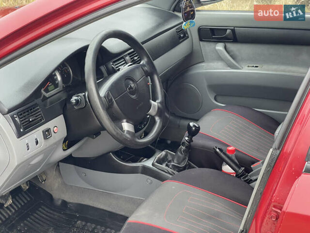 Красный Шевроле Лачетти, объемом двигателя 1.6 л и пробегом 223 тыс. км за 3700 $, фото 20 на Automoto.ua