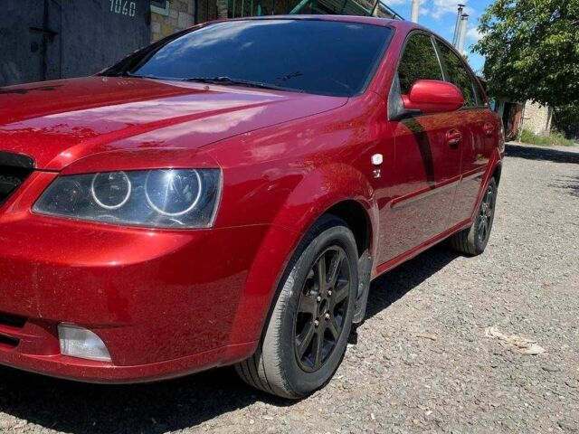 Красный Шевроле Лачетти, объемом двигателя 1.8 л и пробегом 211 тыс. км за 5200 $, фото 5 на Automoto.ua