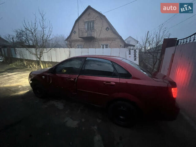 Красный Шевроле Лачетти, объемом двигателя 1.8 л и пробегом 305 тыс. км за 1850 $, фото 7 на Automoto.ua