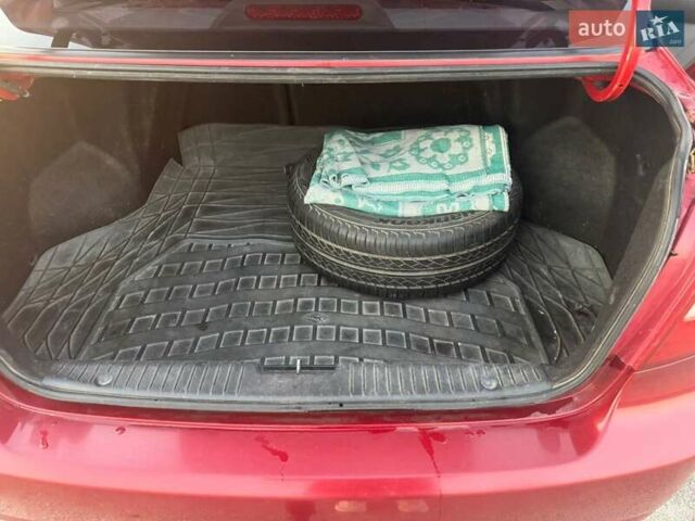 Красный Шевроле Лачетти, объемом двигателя 1.8 л и пробегом 189 тыс. км за 4200 $, фото 14 на Automoto.ua