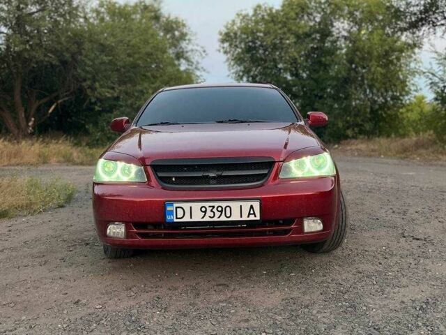 Красный Шевроле Лачетти, объемом двигателя 1.8 л и пробегом 211 тыс. км за 5200 $, фото 3 на Automoto.ua
