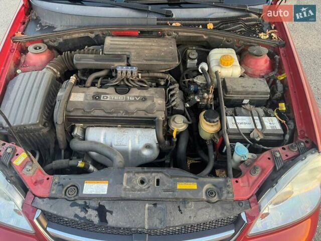Красный Шевроле Лачетти, объемом двигателя 1.8 л и пробегом 189 тыс. км за 4200 $, фото 12 на Automoto.ua