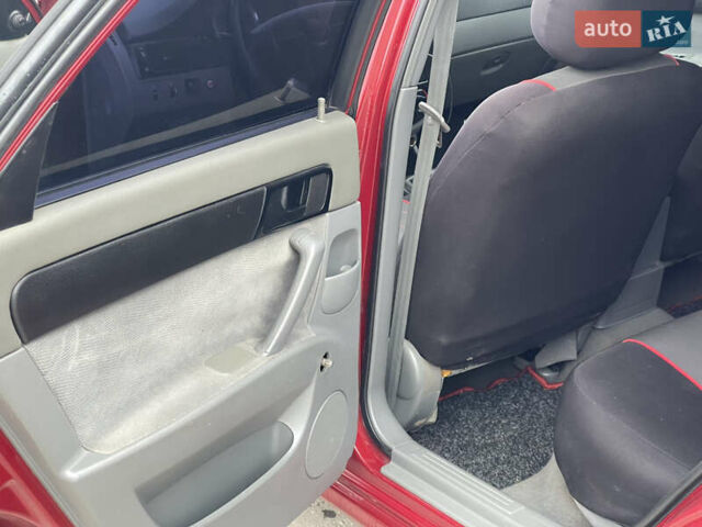 Красный Шевроле Лачетти, объемом двигателя 1.6 л и пробегом 223 тыс. км за 3700 $, фото 24 на Automoto.ua