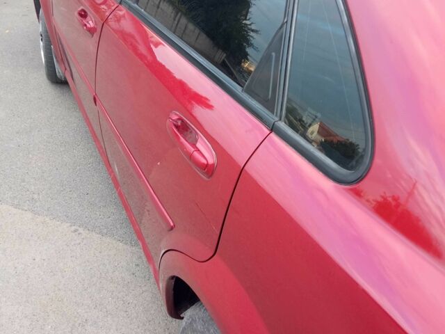 Красный Шевроле Лачетти, объемом двигателя 1.6 л и пробегом 143 тыс. км за 3800 $, фото 3 на Automoto.ua