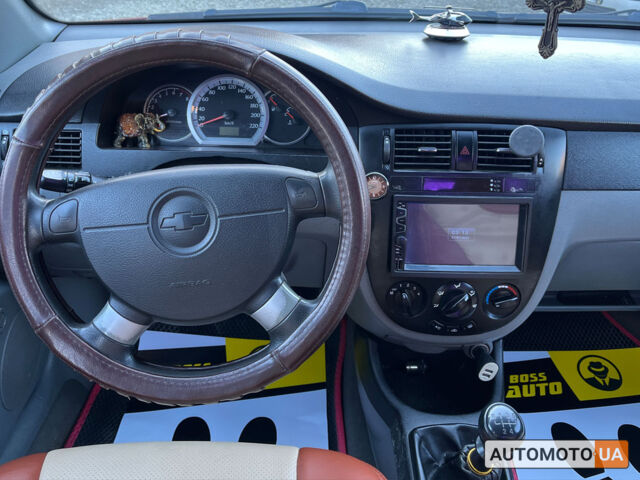 Красный Шевроле Лачетти, объемом двигателя 1.6 л и пробегом 256 тыс. км за 4300 $, фото 16 на Automoto.ua