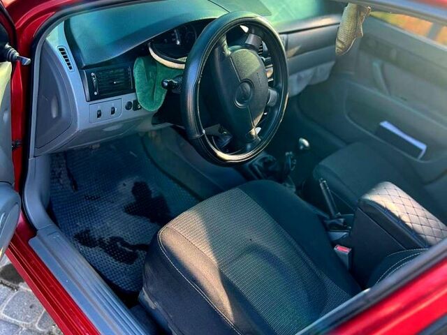 Червоний Шевроле Лачетті, об'ємом двигуна 1.6 л та пробігом 267 тис. км за 4300 $, фото 13 на Automoto.ua