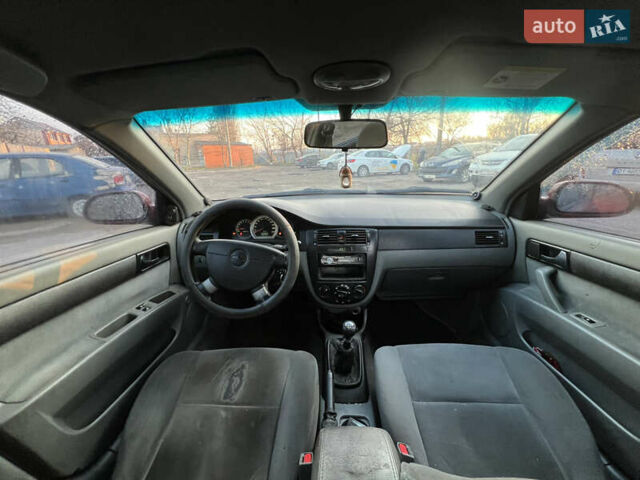 Красный Шевроле Лачетти, объемом двигателя 1.8 л и пробегом 305 тыс. км за 1850 $, фото 13 на Automoto.ua