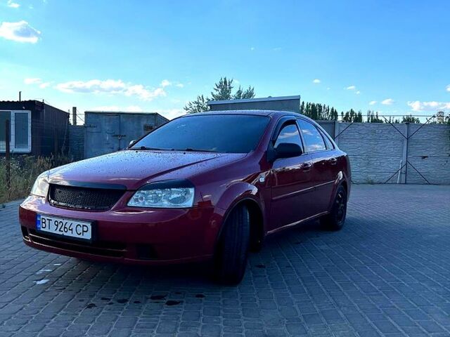 Червоний Шевроле Лачетті, об'ємом двигуна 1.6 л та пробігом 267 тис. км за 4300 $, фото 6 на Automoto.ua