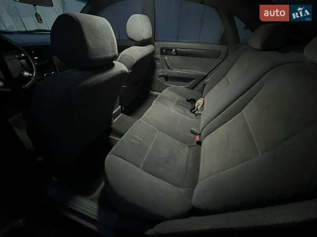 Красный Шевроле Лачетти, объемом двигателя 1.8 л и пробегом 305 тыс. км за 1850 $, фото 10 на Automoto.ua