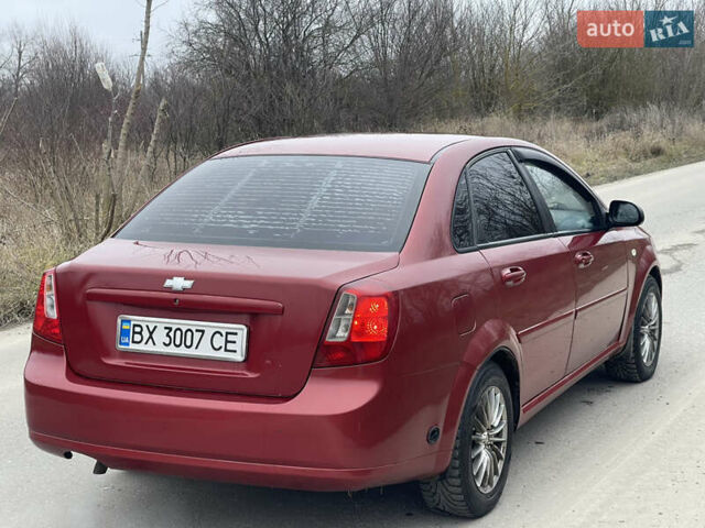 Красный Шевроле Лачетти, объемом двигателя 1.6 л и пробегом 223 тыс. км за 3700 $, фото 18 на Automoto.ua