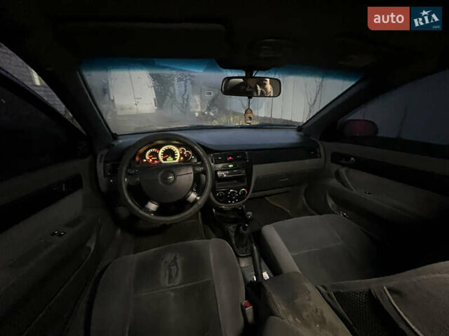 Красный Шевроле Лачетти, объемом двигателя 1.8 л и пробегом 305 тыс. км за 1850 $, фото 11 на Automoto.ua