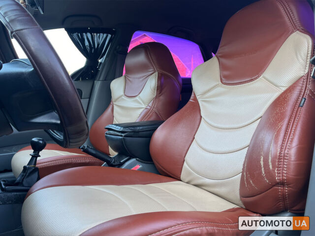 Красный Шевроле Лачетти, объемом двигателя 1.6 л и пробегом 256 тыс. км за 4300 $, фото 9 на Automoto.ua