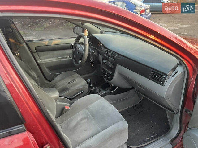 Красный Шевроле Лачетти, объемом двигателя 1.8 л и пробегом 305 тыс. км за 1850 $, фото 10 на Automoto.ua