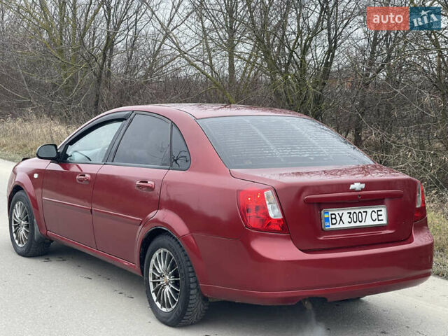 Красный Шевроле Лачетти, объемом двигателя 1.6 л и пробегом 223 тыс. км за 3700 $, фото 13 на Automoto.ua