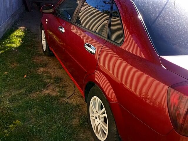 Красный Шевроле Лачетти, объемом двигателя 1.8 л и пробегом 247 тыс. км за 4800 $, фото 3 на Automoto.ua