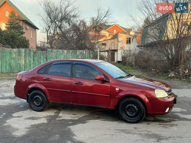 Красный Шевроле Лачетти, объемом двигателя 1.8 л и пробегом 305 тыс. км за 1850 $, фото 1 на Automoto.ua