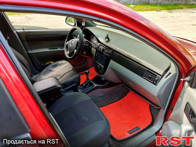 Червоний Шевроле Лачетті, об'ємом двигуна 1.6 л та пробігом 243 тис. км за 3899 $, фото 1 на Automoto.ua