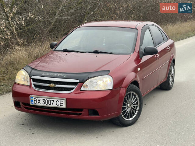 Красный Шевроле Лачетти, объемом двигателя 1.6 л и пробегом 223 тыс. км за 3700 $, фото 1 на Automoto.ua