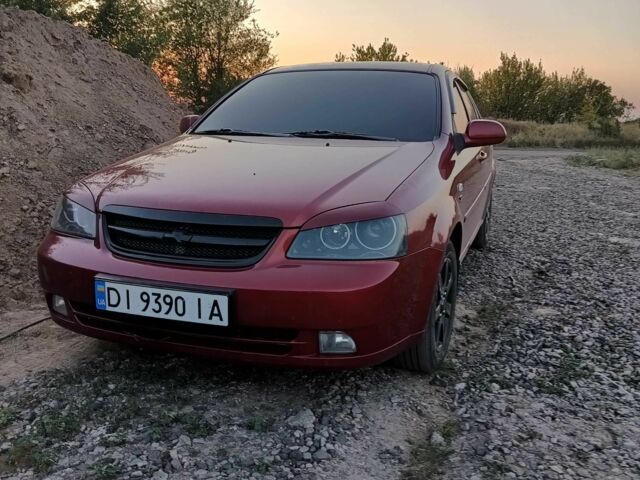 Красный Шевроле Лачетти, объемом двигателя 1.8 л и пробегом 211 тыс. км за 5200 $, фото 9 на Automoto.ua
