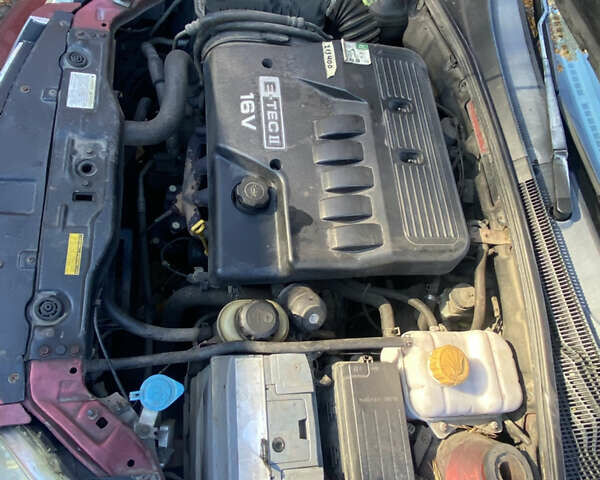 Красный Шевроле Лачетти, объемом двигателя 1.6 л и пробегом 225 тыс. км за 2900 $, фото 12 на Automoto.ua