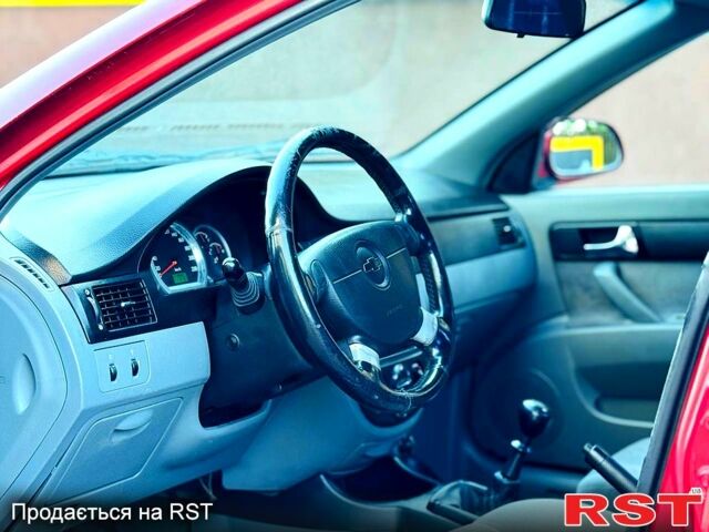 Красный Шевроле Лачетти, объемом двигателя 1.8 л и пробегом 195 тыс. км за 4300 $, фото 2 на Automoto.ua