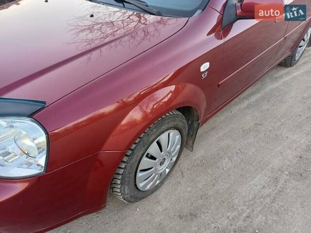 Красный Шевроле Лачетти, объемом двигателя 1.8 л и пробегом 310 тыс. км за 3800 $, фото 8 на Automoto.ua