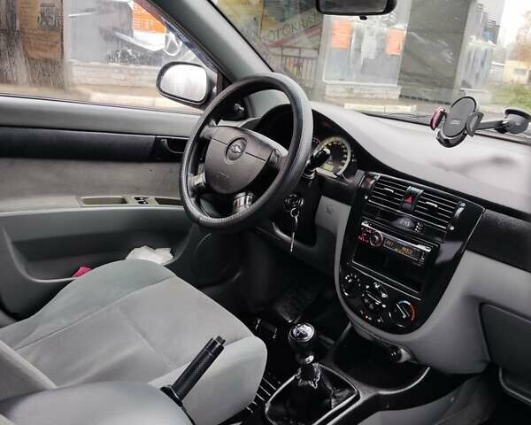 Червоний Шевроле Лачетті, об'ємом двигуна 1.6 л та пробігом 224 тис. км за 3650 $, фото 9 на Automoto.ua