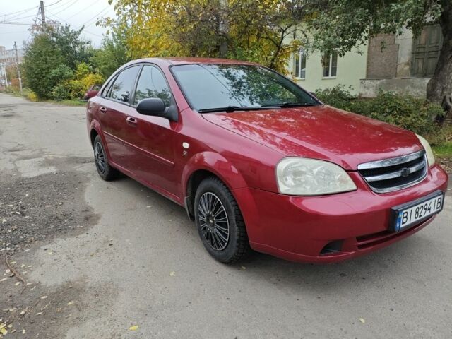 Красный Шевроле Лачетти, объемом двигателя 1.6 л и пробегом 231 тыс. км за 3400 $, фото 2 на Automoto.ua