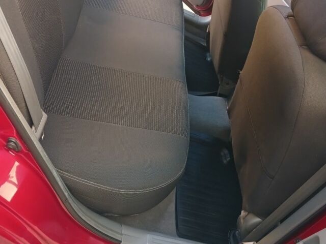 Красный Шевроле Лачетти, объемом двигателя 1.6 л и пробегом 198 тыс. км за 5200 $, фото 4 на Automoto.ua