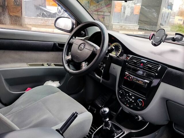 Червоний Шевроле Лачетті, об'ємом двигуна 1.6 л та пробігом 224 тис. км за 3700 $, фото 9 на Automoto.ua