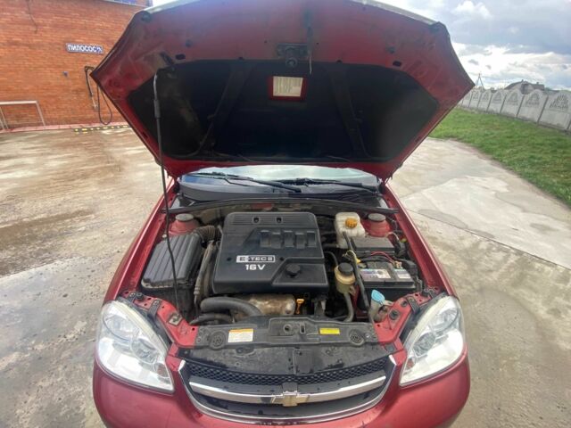 Красный Шевроле Лачетти, объемом двигателя 1.6 л и пробегом 220 тыс. км за 3600 $, фото 4 на Automoto.ua