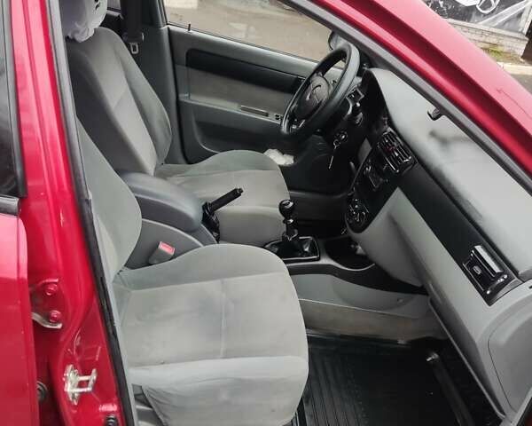 Червоний Шевроле Лачетті, об'ємом двигуна 1.6 л та пробігом 224 тис. км за 3650 $, фото 10 на Automoto.ua