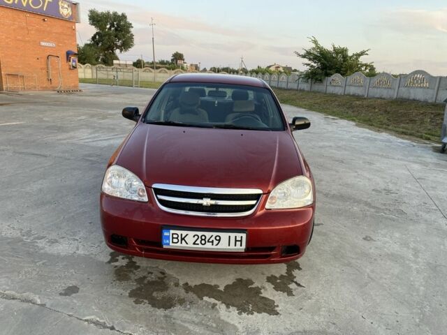 Красный Шевроле Лачетти, объемом двигателя 1.6 л и пробегом 220 тыс. км за 3600 $, фото 12 на Automoto.ua