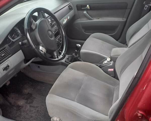Червоний Шевроле Лачетті, об'ємом двигуна 1.8 л та пробігом 140 тис. км за 3200 $, фото 7 на Automoto.ua